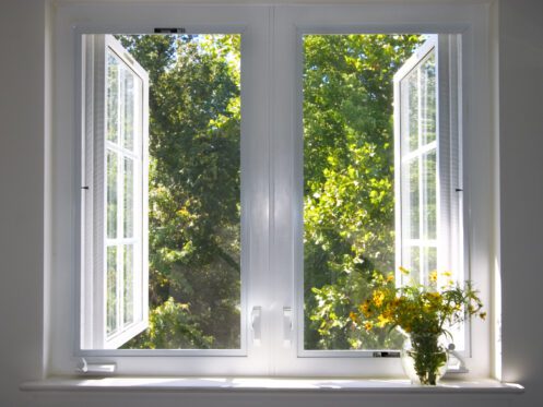 Is it okay to run the AC with the windows open?